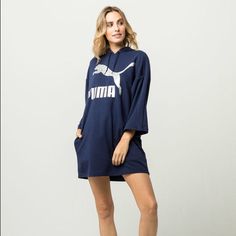 Blue/Silver Puma Glam Oversized Hoodie Dress. Oversized Sweatshirt Dress With Drawstring Hood And French Terry Lining. Features Puma Logo With Mixed Glitter Embellishment Screened Across Front. Side-Seam Pockets. Wide Dropped 3/4 Sleeves. 68% Cotton/32% Polyester. Machine Wash. Imported. Oversized Casual Sweatshirt Dress For Streetwear, Winter Long Sleeve Hoodie With Puma Logo, Puma Oversize Sweatshirts For Women, Oversized Sweatshirt Dress, Winter Puma Logo Hoodie, Casual Puma Logo Long Sleeve Hoodie, Winter Puma Logo Long Sleeve Hoodie, Oversized Hoodie Dress, Puma Logo