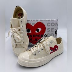 Nwt Unisex Converse X Comme Des Garons Play Chuck 70 Ivory Size Us 7 Women 5 Men Converse Comme Des Garons Play. The Iconic Partnership Between Converse And Comme Des Garons Has Brought The Brand's Conceptual Vision To Streets Across The Globe For Over A Decade-Using The Playful Heart And Eyes Logo In Distinct Ways. This New Release Brings Back The Fan-Favorite Comme Des Garons Play Heart And Eyes Logo On A Minimalist Chuck 70. Featured Here In Contrasting Black On Your Choice Of Vivid Blue Or M Comes Des Garcons Converse Outfit, Bow Converse, Converse Heart Shoes, Garcons Converse Outfit, Converse X Comme Des Garcons, Cdg Converse, Converse Comme Des Garcons, Converse Brown, Play Converse