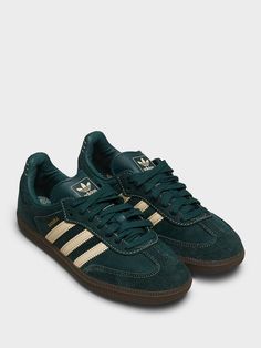 Featuring a regular fit and lace closure, these retro shoes feature a nubuck upper, soft leather lining and durable rubber outsole. Dark Green Adidas Shoes, Street Wear Sneakers, Cool Girl Shoes, Cool Sneakers Women, Nike Shoes Ideas, Women’s Sneakers, Cool Shoes Women, Retro Adidas Shoes, Low Shoes Women