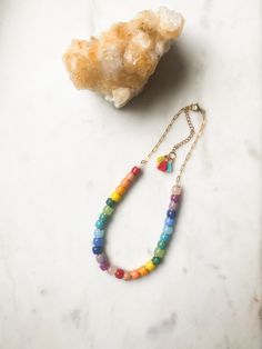 "ABOUT THIS PIECE:  A cheerful, limited edition necklace. Materials include: glass, semi-precious stone, cotton tassels, 14k gokd vermeil paperclip chain. 16\" long with 2\" extender. Vermeil hardware. Vermeil is a tarnish resistant material that has a 925 sterling silver base metal and is coated in 2.5 micron thickness of 14k gold.  Note: also available in choker length if that is your preference. To measure your next size, take a string and wrap it around your neck, then measure the length of Bracelet Inspo, Rainbow Necklace, Eco Friendly Jewelry, Bracelet Ideas, Necklace Unique, Colorful Jewelry, Unique Necklace, Necklace Statement, Trombone