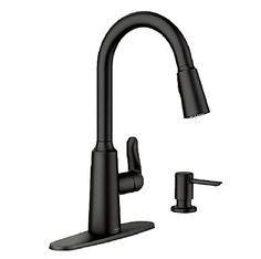 a black kitchen faucet with two handles and nozzles on the side