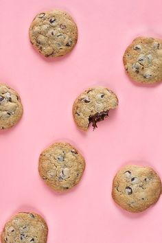 chocolate chip cookies on a pink background