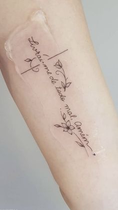 a woman's arm with a tattoo that reads, i love you to the moon and back