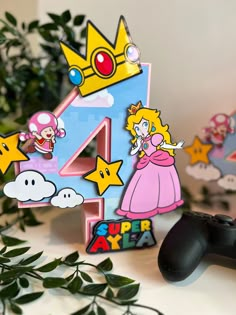 a video game themed number four with mario and princess peach