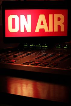 an on air sign sitting on top of a sound board royalty images and clippings