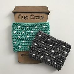 two crocheted cup cozys sitting next to each other