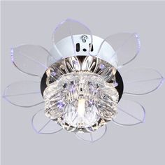 a close up of a flower shaped light fixture