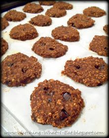 cookies are lined up on a baking sheet