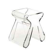 a clear glass table with a curved design on the top and bottom, sitting in front of a white background