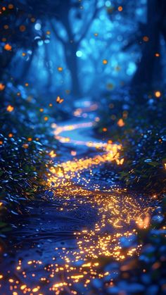 a path in the middle of a forest with lots of fireflies flying over it