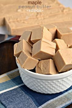 a white bowl filled with pieces of brown fudge