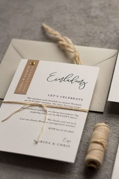 the wedding stationery is laid out and ready to be put into their guests'envelopes