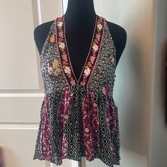 Nwt. Deep Plunge Neck Line For That Perfect Summer Top! Size Large Very Comfortable Lightweight Top In Black Purples Orange White Floral Design. Measurements In Photo. Purple Halter Top For Spring Vacation, Purple Halter Top For Vacation In Spring, Purple Summer Tops For Night Out, Purple Summer Top For Night Out, Purple Top For Summer Night Out, Purple Triangle Halter Top For Spring, Purple Halter Neck Top For Vacation, Purple Halter Neck Top For Summer, Purple Halter Top For Night Out In Summer