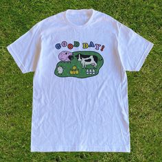 These farm shirt is perfect for those who love the colorful and wonderful kawaii clothing and kidcore clothing aesthetic. It's kawaii shirt and kidcore shirt for those who loves the farm life or those who just simply grew up playing farming simulation games. This Y2K Aesthetic T Shirt is a perfect gift for her, gift for him, gift for gamers or anyone in between as these shirts are unisex. Available in Sizes XS, S, M, L, XL, 2XL and 3XL. ✨ 100% ⭐️ PREMIUM ⭐️ Airlume combed and ringspun cotton  ✨ Playful Cotton T-shirt For Streetwear, Cute Cotton T-shirt With Funny Print, Cute Graphic Design T-shirt For Streetwear, Kawaii Cotton T-shirt With Letter Print, Fun Cotton Tops With Graphic Design, White Kawaii Tops With Graphic Print, Playful White Cotton T-shirt, White Kawaii Top With Graphic Print, Trendy Cotton Shirt With Cartoon Print