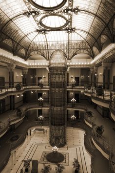 the inside of a large building with many balconies