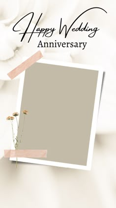 an anniversary card with flowers on it