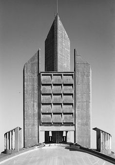 a black and white photo of a tall building