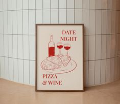 a sign that says date night pizza and wine next to a wall with tile on it