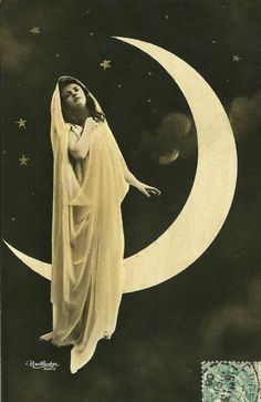 an old postcard with a woman on the moon