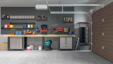 the garage is clean and ready to be used as a workbench or storage area