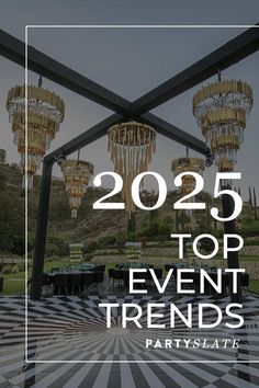 an event tent with chandeliers hanging from it and the words, 205 top event trends party slatt