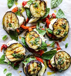 grilled eggplant, tomato and spinach salad with parmesan cheese