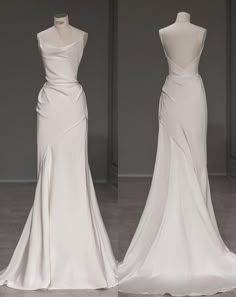 two white wedding dresses on mannequins in an empty room