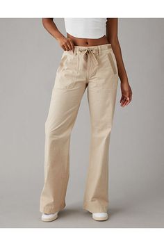 Crisp poplin with a hint of stretch/Drawstring waist/Patch pockets with zip closure/Back pockets with button flap/This is Real Good: Made with the planet in mind & a promise to continue to do better. Flare Pant, Do Better, Flare Pants, Drawstring Waist, Low Rise, Women's Jeans, American Eagle Outfitters, American Eagle, Women Jeans