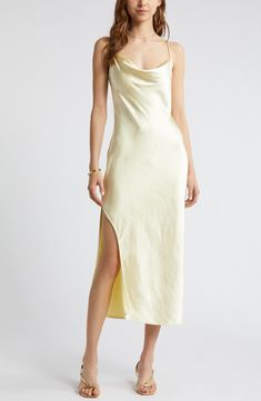 Effortless to style up or down, this gracefully draped satin slipdress belongs in your wear-on-repeat collection. 26 1/2" to 46" center front length (size Medium) Cowl neck Adjustable straps Unlined 100% polyester Machine wash, tumble dry Imported Yellow Slip Dress, Cowl Dress, Yellow Satin, Cowl Neck Dress, Open Back Dresses, Heart Eyes, On Repeat, Event Dresses, Silk Dress