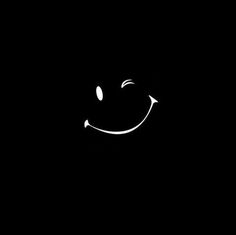 a smiley face drawn in the dark