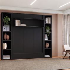 a living room with a book shelf and chairs