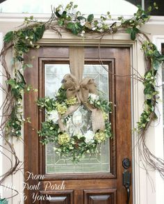 a front door with a wreath on it