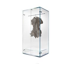 an object is in a glass box with some sort of material inside it, on a white background