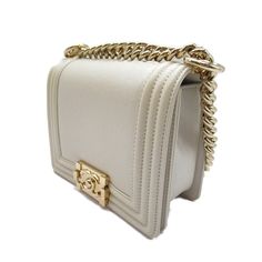 This Mini Boy Bag features a White Leather. Assured Product ity: This product is supplied by a renowned and trusted partner. With this purchase you are preserving iconic craftsmanship celebrating heritage and embracing the beauty of sustainable shopping. Luxury Flap Bag As Gift, Luxury Square Flap Bag As Gift, Classic Top Handle Evening Bag As Gift, Classic Gold Shoulder Bag For Gift, Classic Gold Shoulder Bag As Gift, White Luxury Flap Bag Perfect As A Gift, Luxury White Flap Bag As A Gift, Classic Square Bags For Everyday Luxury, Classic Square Everyday Luxury Bag