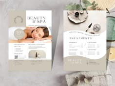 two flyers for a spa with flowers and candles on the table next to them,