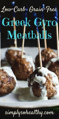 greek gyro meatballs on a plate with toothpicks