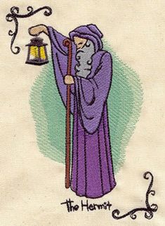 a card with an image of a man holding a lantern and the words, the hermit