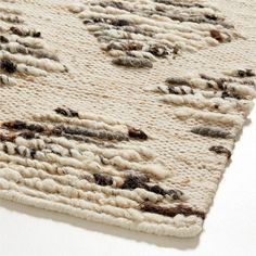 an area rug that has been made with yarn