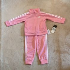 Adidas Baby Girls Tracksuit Size 18 Months. Pink And White In Color. Brand New! Pink Adidas Cotton Set, Adidas Pink Cotton Sets, Pink Cotton Adidas Sets, Adidas Pink Long Sleeve Sets, Adidas Pink Playwear Sets, Adidas Fitted Sets For Playwear, Adidas Fitted Playwear Sets, Adidas Pink Fitted Sets, Fitted Pink Adidas Sets