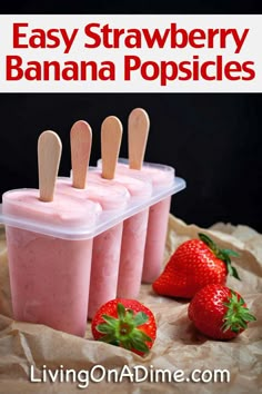 strawberry banana popsicles in plastic containers with strawberries on the side and text overlay reading easy strawberry banana popsicles