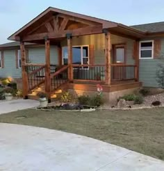 a house that is sitting in the grass