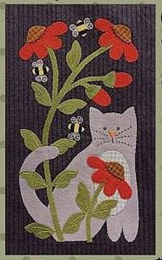 an image of a cat with flowers on it