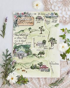 a map with flowers and greenery on it