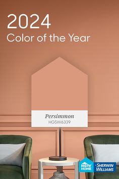 two green chairs sitting next to each other in front of a sign that says color of the year