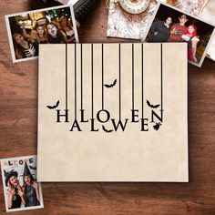 a table topped with photos and halloween decorations