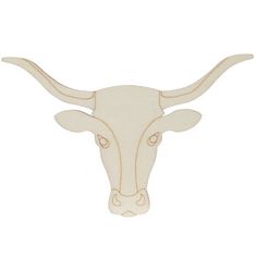 the head of a bull with horns is shown on a white background and has been cut out from wood