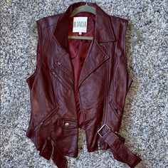 Bb Dakota Faux Leather Moto Vest. Never Worn. Color: Burgundy / Size: L. Belt Included Sleeveless Leather Vest, Red Leather Vest, Leather Vest Outfit, Cardigan Vest Sleeveless, Vest Outfits For Women, Faux Vest, Moto Vest, Draped Sweater, Faux Leather Vest