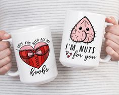 two coffee mugs that say i'm nuts for you and love you with all my heart