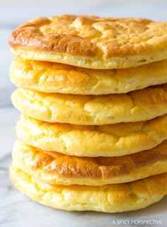 a stack of pancakes sitting on top of a table