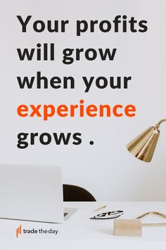 a white desk with an orange and black quote on the wall that says, your profits will grow when your experience grows